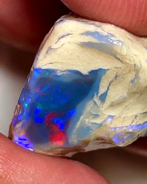 Lightning Ridge Rough Opal Dark Base Crystal Big Knobby 70cts Blues Red Green Multifires in stunning bar  35x25x15mm WAB92