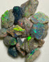 Reds of Lightning Ridge Dark base & Crystal 51.00cts Reds & Multicolours to chase ? Plenty potential  18x12x3 to 9x6x4mm NSW068