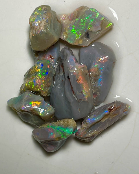 Bright Multicolour cutters rough from Lighting Ridge 36.50cts Yellows/Oranges/Reds here 19x13x4mm to 11x8x3mm NSW183