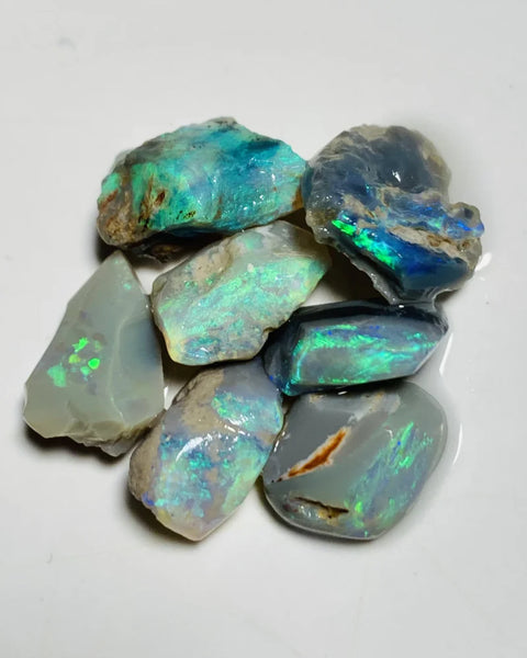 Lightning Ridge Opal Rubs n rough Parcel Dark bases from the Miners Bench® 31cts Stunning Bright Multifires to faces 15x8x6mm to 12x8x5mm WSY57