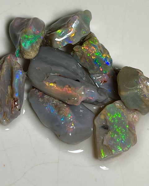 Bright Multicolour cutters rough from Lighting Ridge 36.50cts Yellows/Oranges/Reds here 19x13x4mm to 11x8x3mm NSW183