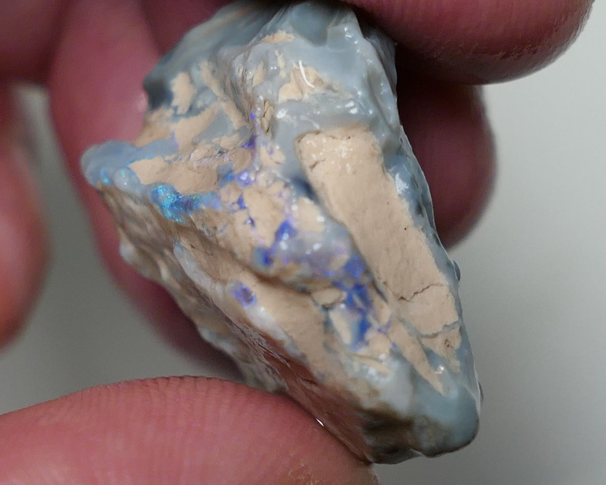 Lightning Ridge Rough Opal 39cts Dark Base Seam formation showing some Blues in the bars 27x25x15mm 0557