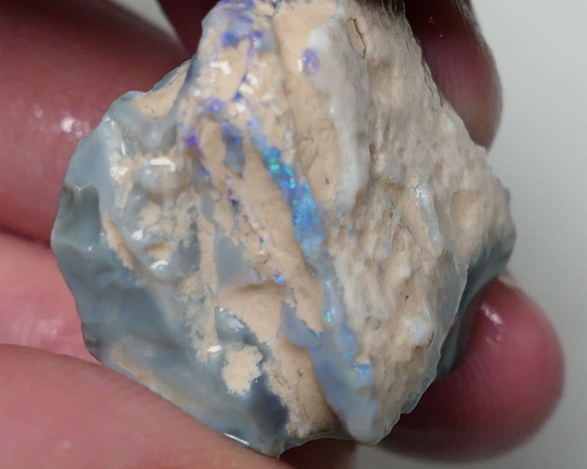 Lightning Ridge Rough Opal 39cts Dark Base Seam formation showing some Blues in the bars 27x25x15mm 0557