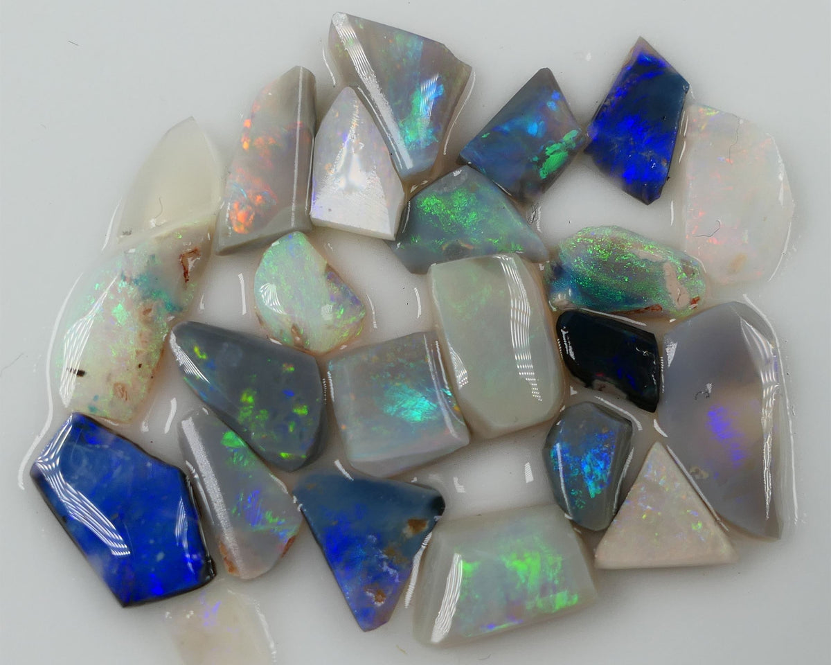 Lightning Ridge Rub Rough Parcel 14cts Stunning Little Gems all the colours in this parcel 12x6x2mm to 4x3x2mm 0634