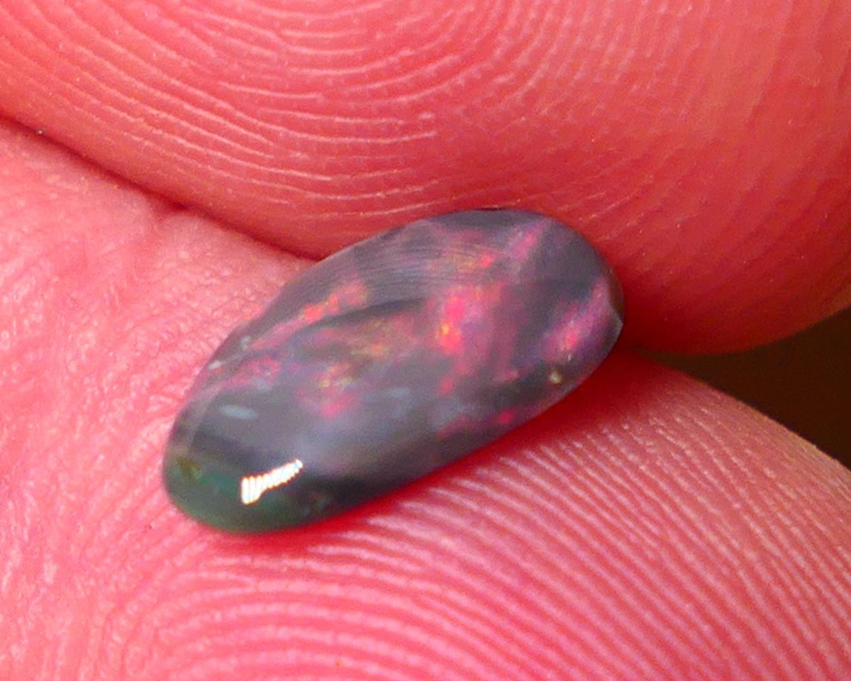 Lightning Ridge Red on Dark base Opal Gemstone 0.7cts Red dominant fires with Flat face 10x5x2mm 0652