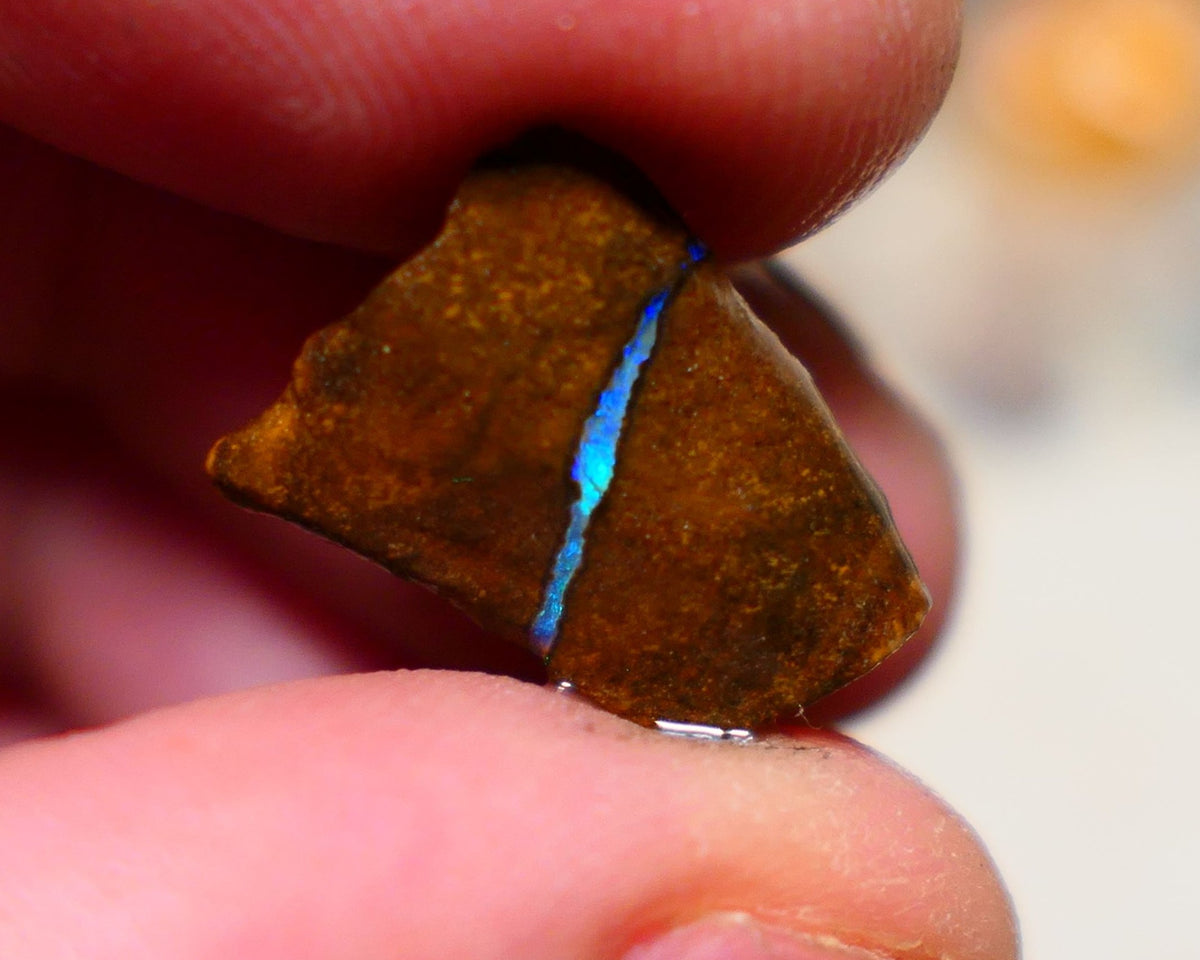 Queensland Boulder Boulder opal 6.40cts rough rub with some nice Gren/Blue fires in the vein 16x12x4.5mm BO-007