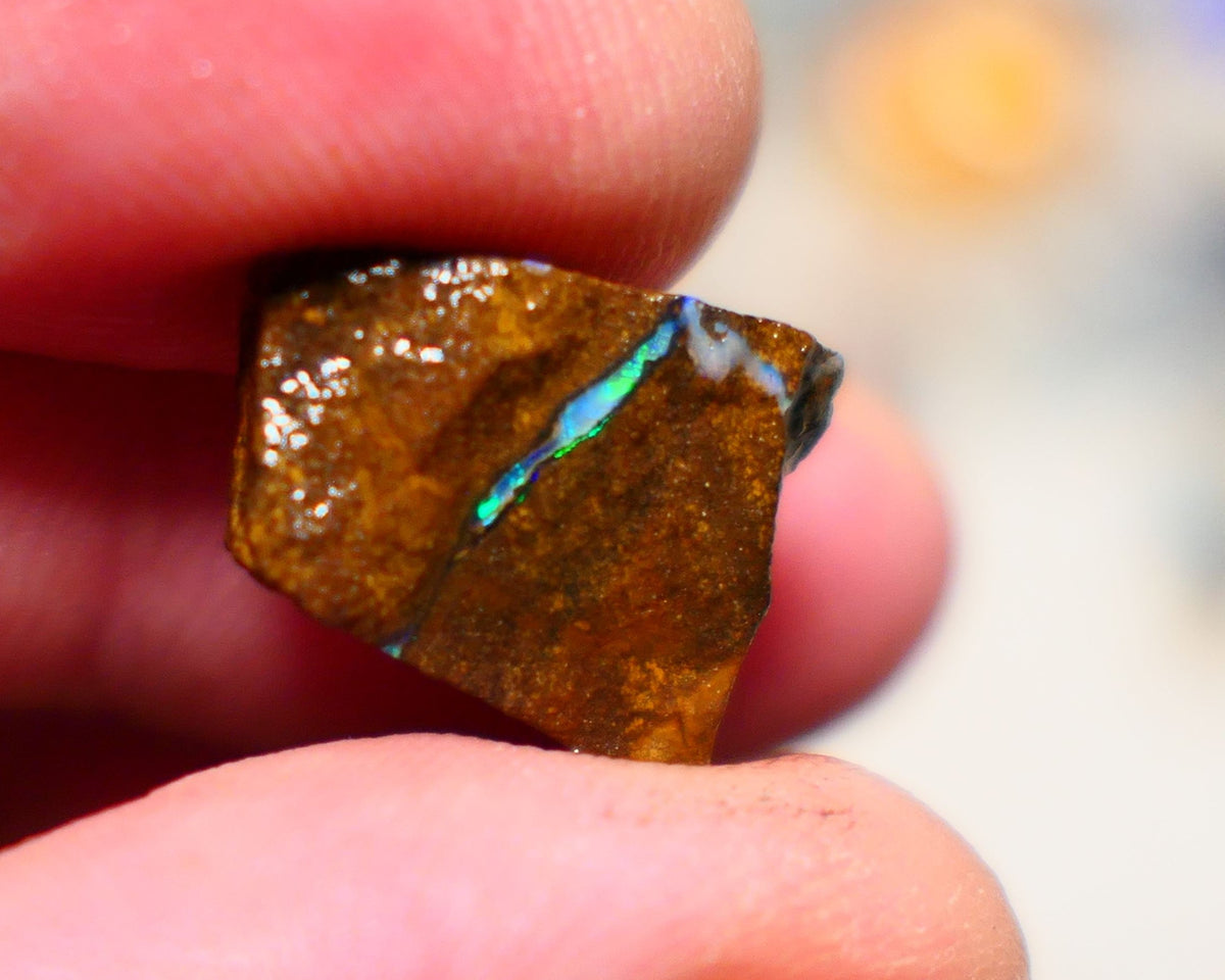 Queensland Boulder Boulder opal 6.40cts rough rub with some nice Gren/Blue fires in the vein 16x12x4.5mm BO-007