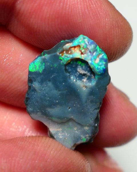 Lightning Ridge Black Rough Opal 10cts Gamble showing some Bright Green & blue fires 24x15x4mm 1330