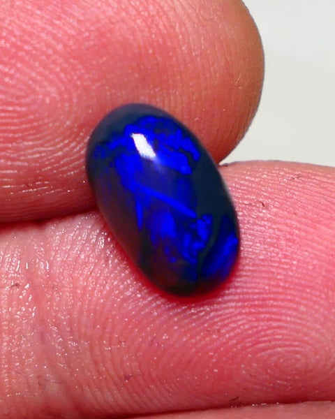 Lightning Ridge Semi Black Crystal Opal High Dome Gemstone 2.00cts GEM Grade N5 Body Tone B3 Brightness  Rolling Flash Royal Blues in various patterns 12.2x7.3x3.8mm 1327