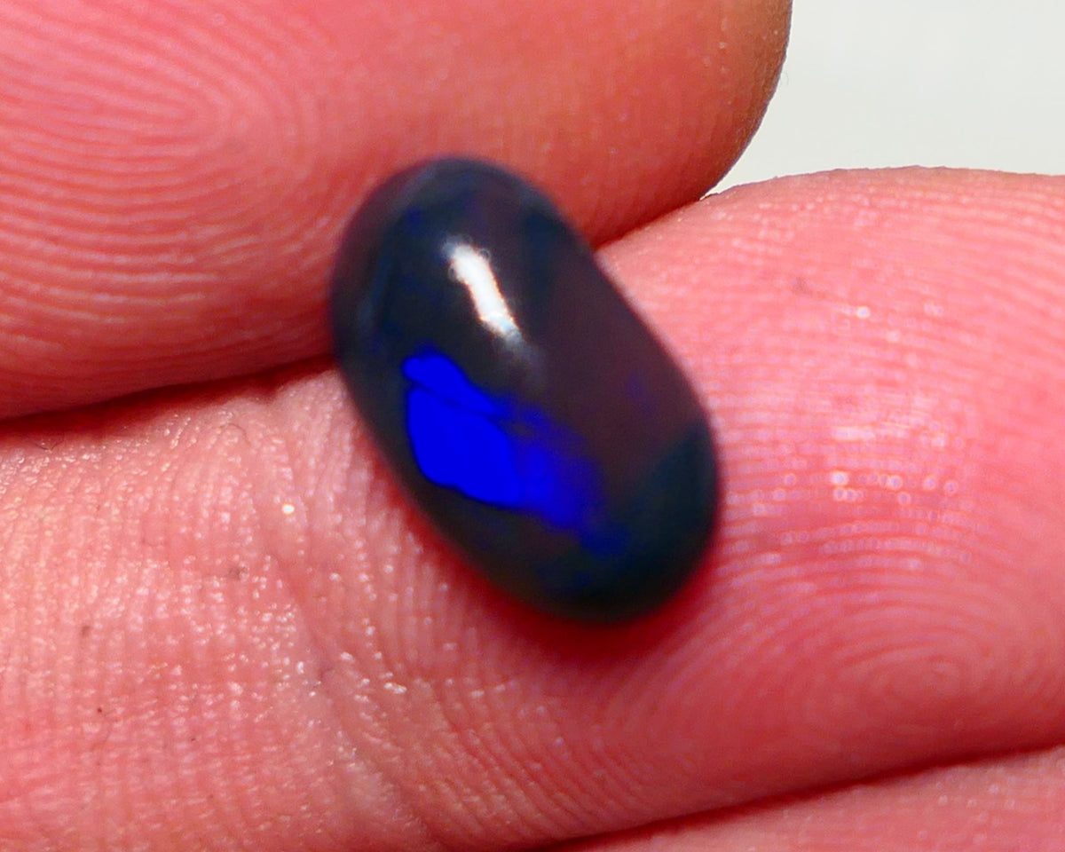 Lightning Ridge Semi Black Crystal Opal High Dome Gemstone 2.00cts GEM Grade N5 Body Tone B3 Brightness  Rolling Flash Royal Blues in various patterns 12.2x7.3x3.8mm 1327