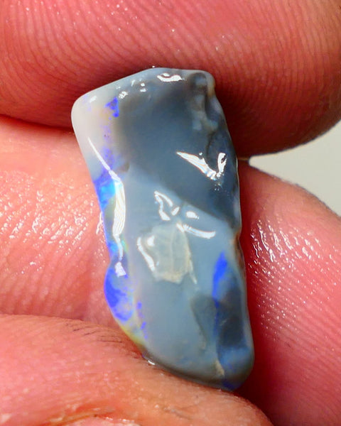 Lightning Ridge Rough Opal 7cts Dark Base Seam showing Nice bright blues colours 19x9x7mm NS050