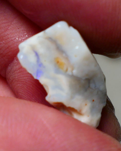 Lightning Ridge Rough Opal 7.75cts Grey Base Gamble Seam some Blue fires in the bar 20x11x6mm Auction NS033