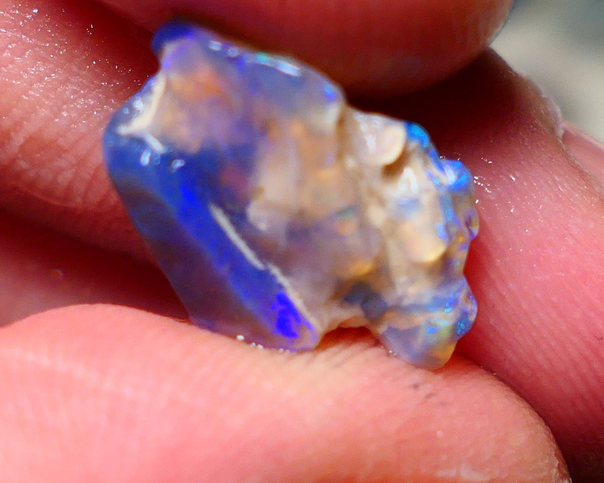 Lightning Ridge Rough Opal 5.75cts Dark Base Crystal Seam piece showing nice blues colours 16x11x6mm NS027