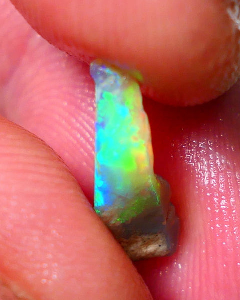 Small Candy to Cut Crystal on dark base 1.80cts Exotic bar with Vivid & Bright fires 14x5x4mm NS144