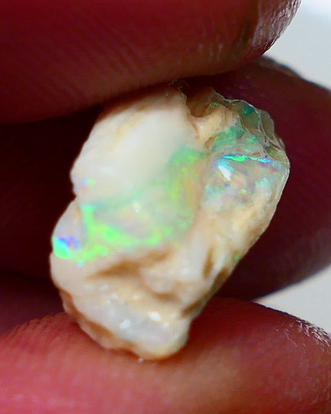 Lightning Ridge Rough Opal 7.15cts Light Base Seam showing  Bright multi colours 17x9x8mm NS311