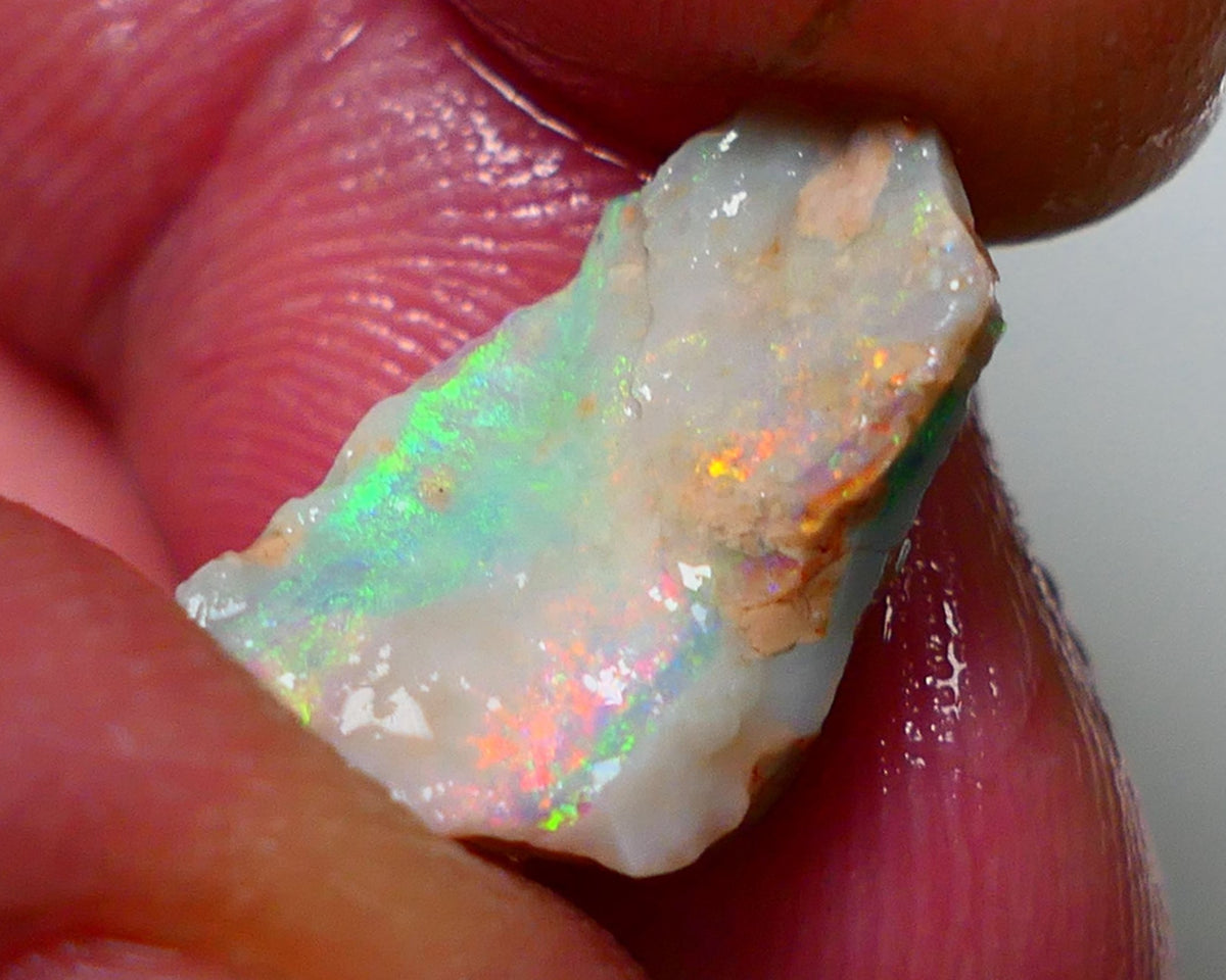 Lightning Ridge Rough Opal 4.90cts Crystal Seam showing Reds & multi colours 16x9x8mm NS313