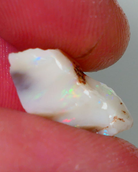 Lightning Ridge Rough Opal 9.40cts Light base Seam showing Yellow Dominant M.colours to cut 18x13x10mm NS331