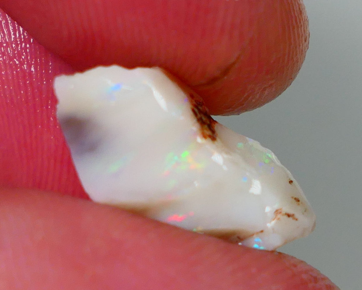 Lightning Ridge Rough Opal 9.40cts Light base Seam showing Yellow Dominant M.colours to cut 18x13x10mm NS331