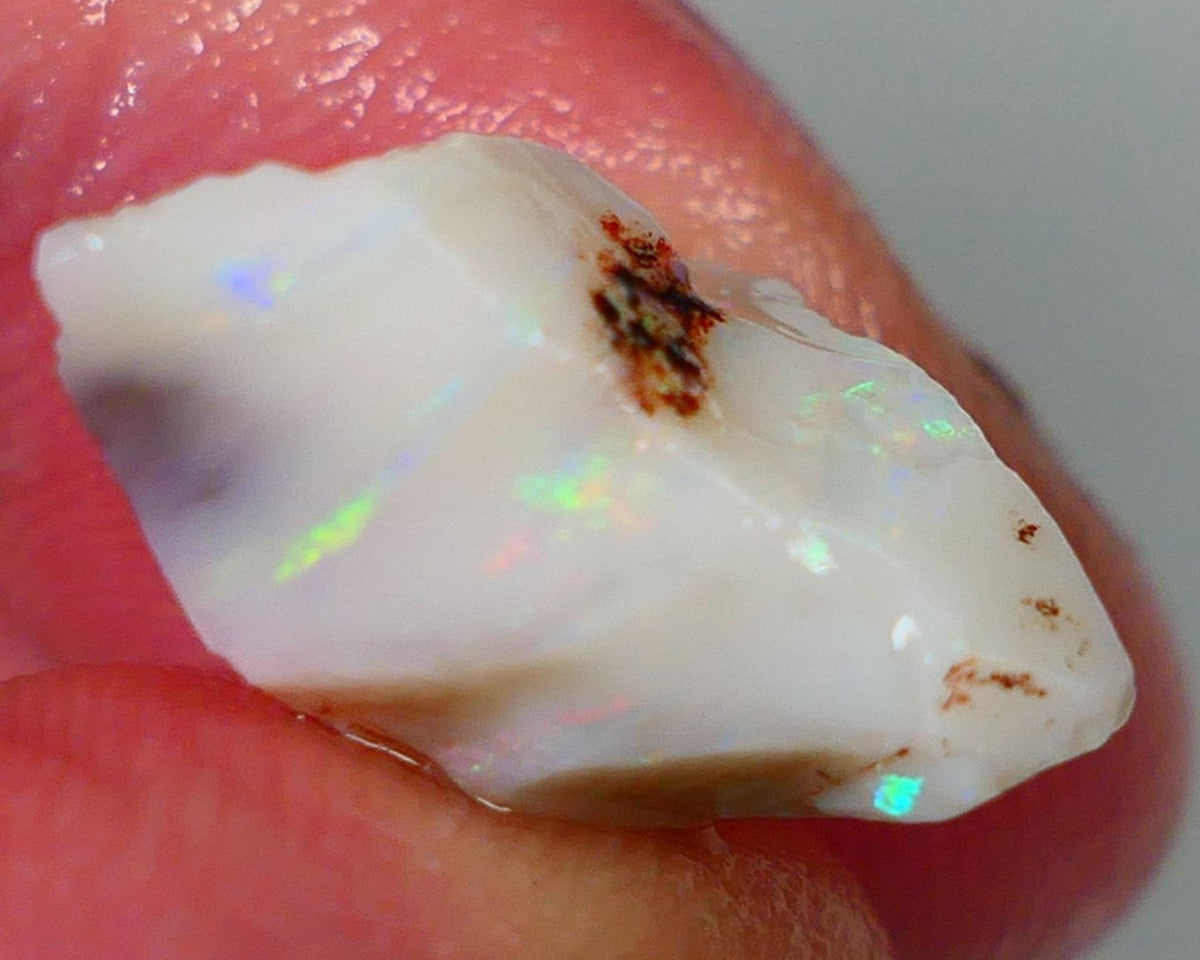 Lightning Ridge Rough Opal 9.40cts Light base Seam showing Yellow Dominant M.colours to cut 18x13x10mm NS331