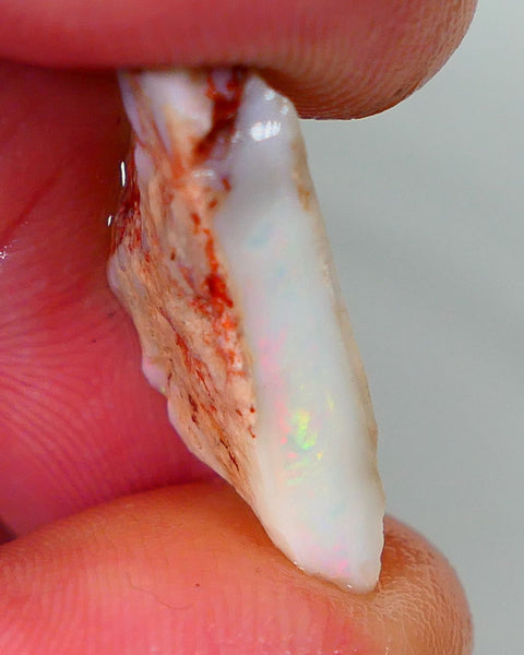 Lightning Ridge Rough Opal 7.25cts Light base Seam showing Bit of Yellow Dominant M.colours 22x10x4mm NS330