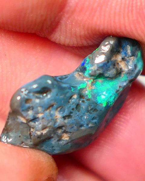 Lightning Ridge Rough Opal 14.00cts Dark Base rough with some pinfire flashes of bright Green/Blue Bar 24x17x7mm NS348