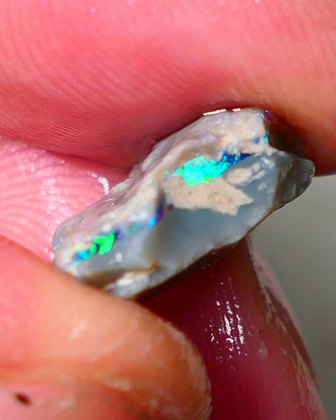 Lightning Ridge Seam opal rough 6.05cts showing Gemmy Very bright consistent flt bar with multi colours to cut worth a gamble on this one cut a gem 16x12x6mm ALP117