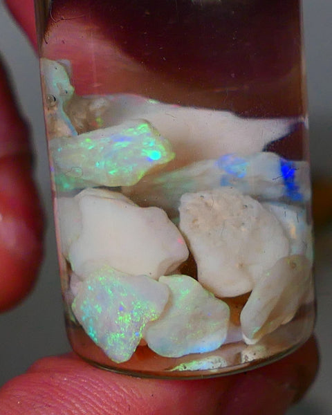 Lightning Ridge Rough Opal Small seams 21cts Light base Multicolours 11mm to chip size range Auction74