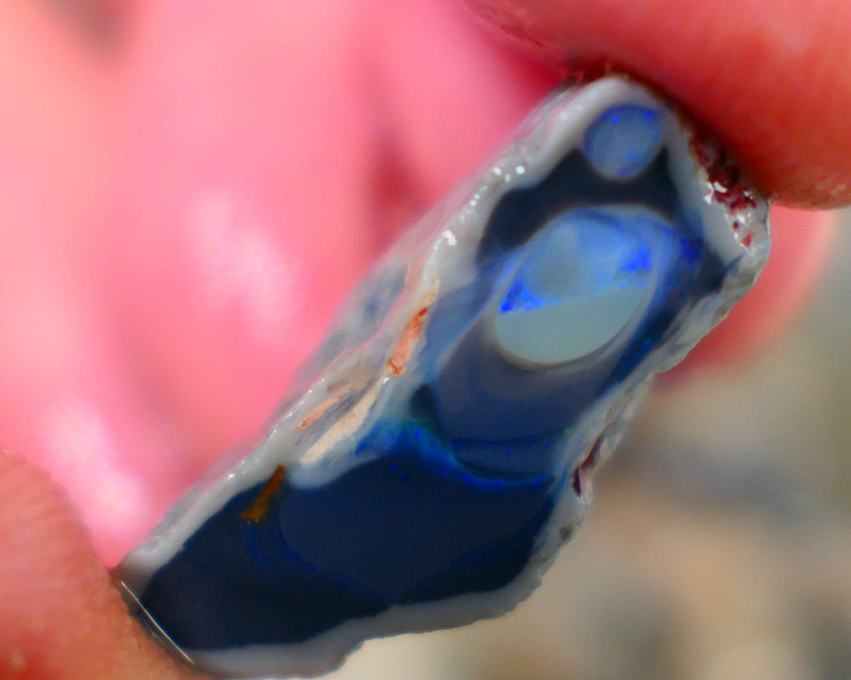 Lightning Ridge Rough Opal half of a black centered knobby split 15.00cts Showing Blue fires Maybe a Picture stone? 24x13x9mm Auction103