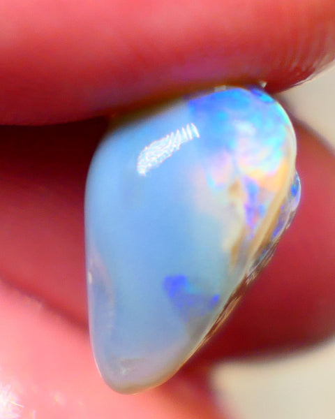 Lightning Ridge Rough knobby opal 7.80cts Dark base fresh from wash showing blue fires in scattered a scattered 15x10x9mm Auction131