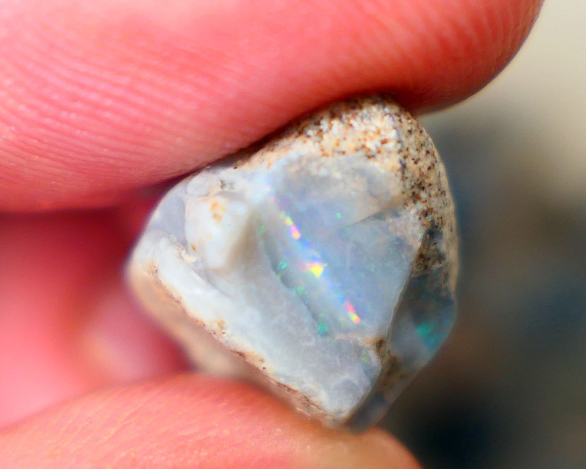 Mintabie Seam opal rough 13.50cts Multicolours showing in the exposed bar sold as gamble Auction211