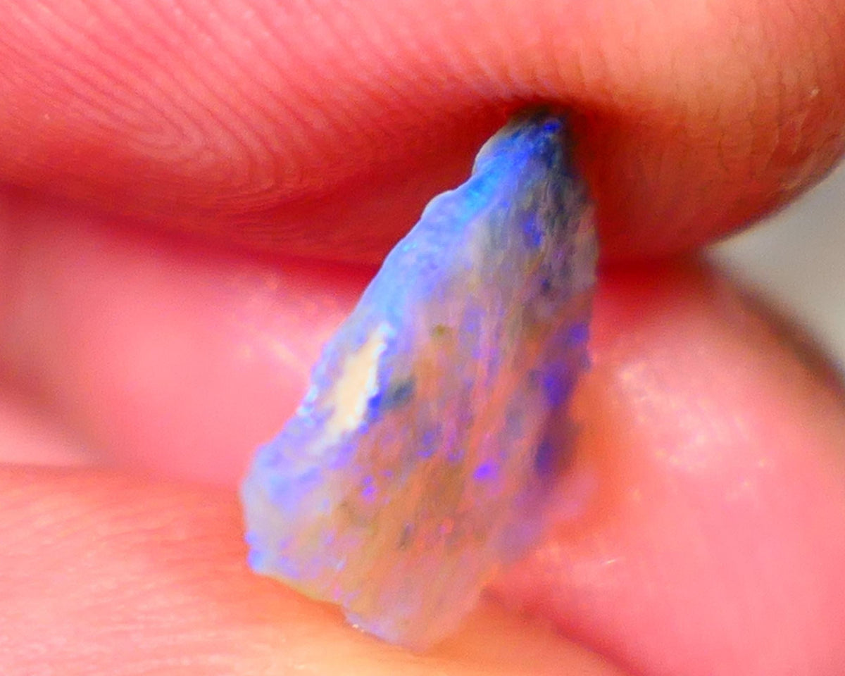 Lightning Ridge Dark base Crystal Seam opal 1.30cts Note this is thin So suit inlay/doublet etc Nice Bright Blue fires to work with 12x11x1.5mm GMB-025