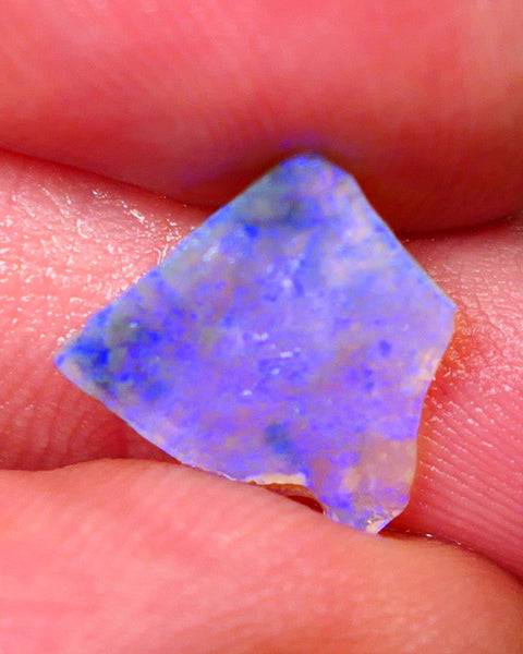 Lightning Ridge Dark base Crystal Seam opal 1.30cts Note this is thin So suit inlay/doublet etc Nice Bright Blue fires to work with 12x11x1.5mm GMB-025