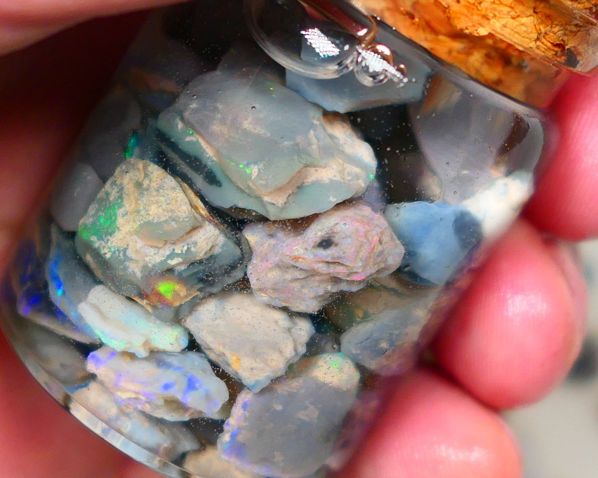 Lightning Ridge Potch & Colours Dark base & Crystal opal rough 150.00cts Lots of colours to go at 15mm to chip size GMB-051