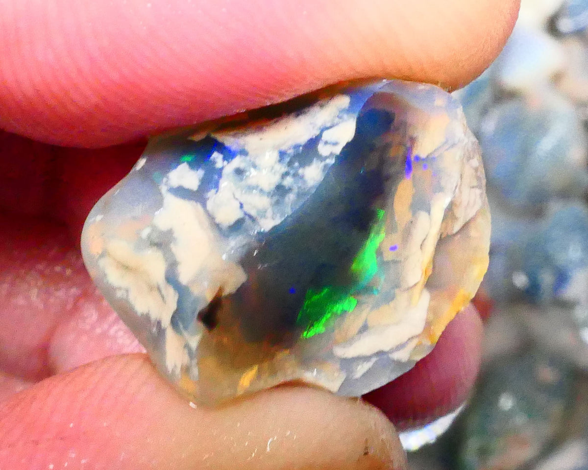 Lightning Ridge Dark Crystal base Knobby split 25.50cts Sun Flashes & Patterns of Green/Yellow/Orange/Blue dominant M.fires 24x19x12mm & 22x13x12mm NSW105