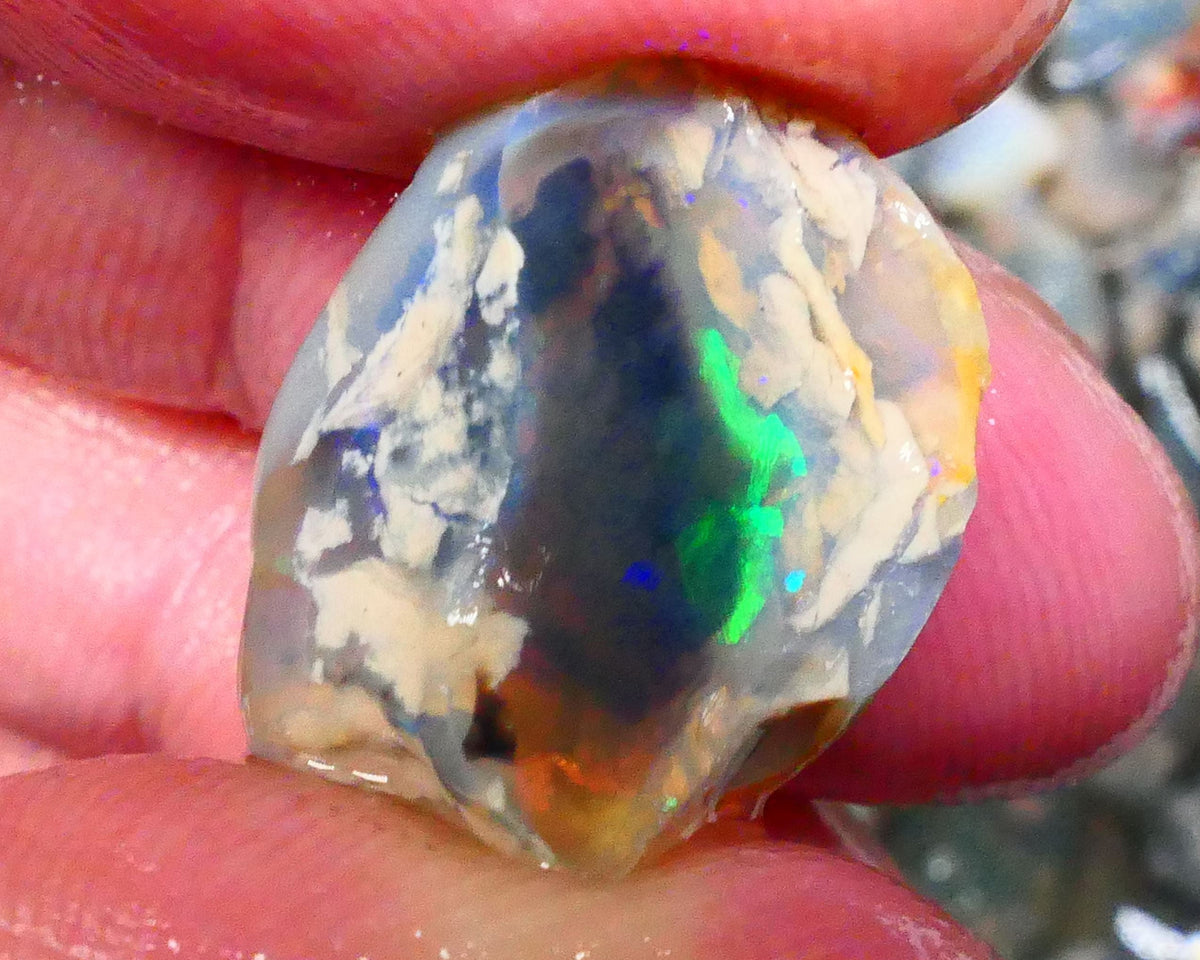 Lightning Ridge Dark Crystal base Knobby split 25.50cts Sun Flashes & Patterns of Green/Yellow/Orange/Blue dominant M.fires 24x19x12mm & 22x13x12mm NSW105