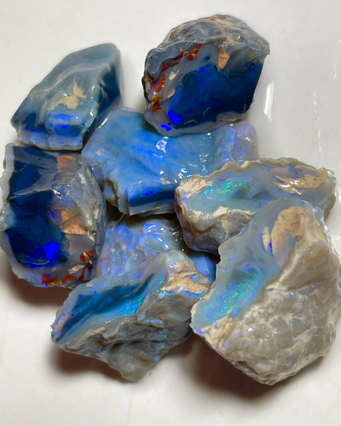 Lightning Ridge Black & Dark Knobby opal splits 135.00cts Mostly blues with some Greens bars sowing potential to cut 23x20x8mm to 17x15x12mm NSW185