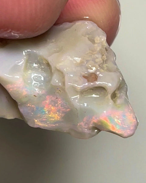 Lightning Ridge Rough Opal 16.75cts Untouched  Dark Seam Pink / orange dominant Multicolours to cut 26x15x9mm NSA004