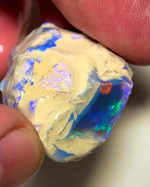 Lightning Ridge Rough Opal Dark Base Crystal Big Knobby 70cts Blues Red Green Multifires in stunning bar  35x25x15mm WAB92