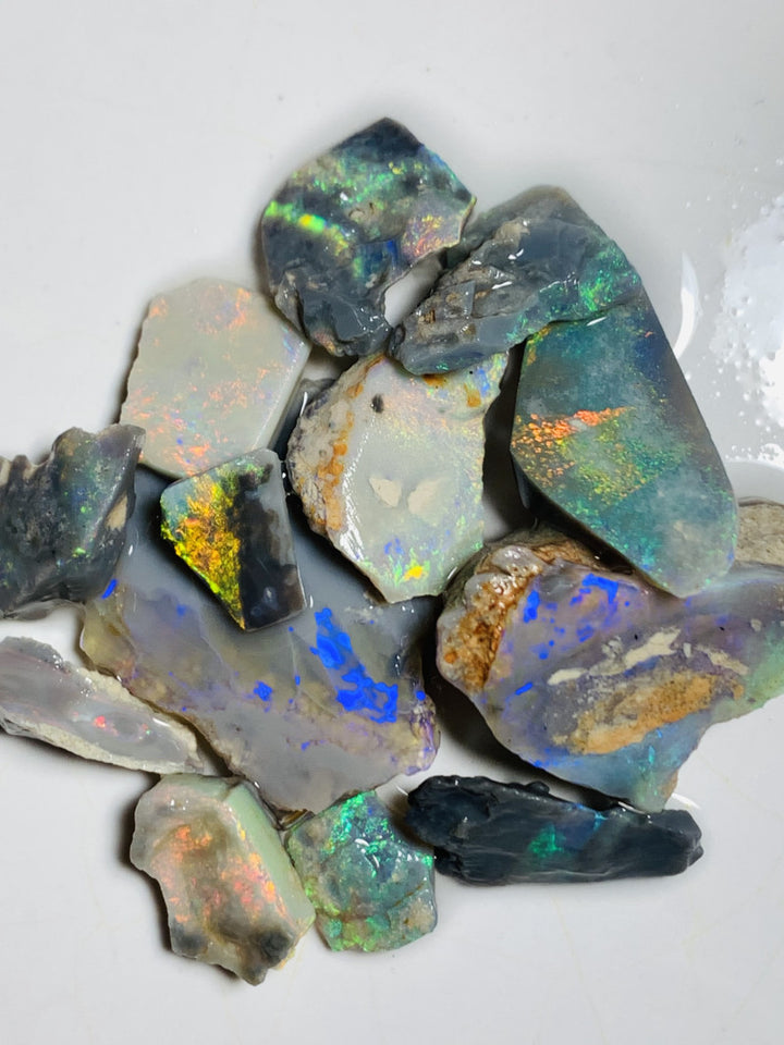 Lightning Ridge Opal Rub n rough Parcel Black & Semi Black  parcel from the Miners Bench® 64cts Stunning Bright Multifires to faces 27x22x3mm to 10x8x4mm WST85