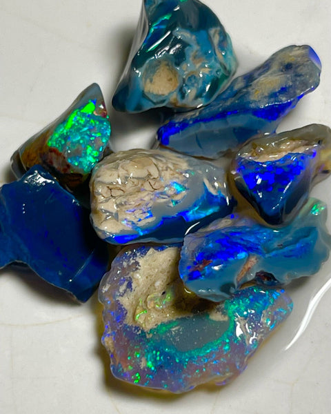 Very Bright Blue /Green dominant fires in this parcel of Black & Dark opal rough 35.75cts Lightning Ridge Material to cut 18x14x3mm to 10x8x7mm NSW184