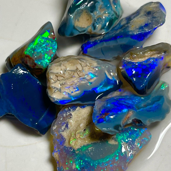 Very Bright Blue /Green dominant fires in this parcel of Black & Dark opal rough 35.75cts Lightning Ridge Material to cut 18x14x3mm to 10x8x7mm NSW184