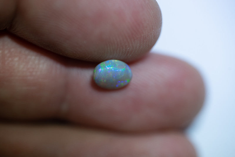 Crystal Opal Gemstone 0.95cts N7 Body Tone B2 Brightness  Broadflash & Brush Stroke pattern with TOP Multi colour fires WSA041021C